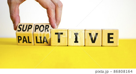 Palliative or supportive therapy symbol. Doctor turns cubes, changes words palliative to supportive. Beautiful white background, copy space. Medical, palliative or supportive therapy concept. 86808164