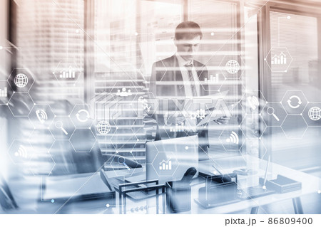 Diagram automation innovation concept. Against the background of young businessmen in the office Diagram automation innovation concept. Against the background of young businessmen in the office 86809400