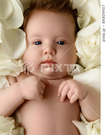 Portrait of a beautiful little baby girl with 86809407