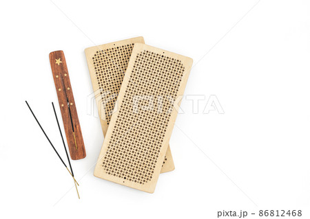 Board with nails Sadhu white background, top view copy space. The practice of standing on nails 86812468