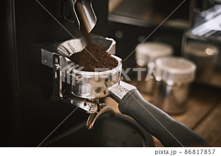 Coffee grinder grinding 86817857