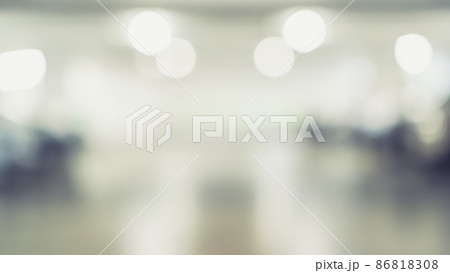 Parking garage blur background with blurry building interior lot space and bright illumination light bokeh for automotive vehicle and car insurance safety concept Parking garage blur background with blurry building interior lot space and bright illumination light bokeh for automotive vehicle and car insurance safety concept 86818308