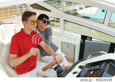 Couple Enjoying Sea Trip Couple Enjoying Sea Trip 86829598