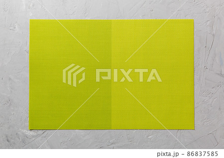 Top view of green tablecloth for food on cement background. Empty space for your design 86837585