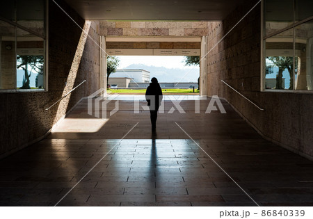 Belem, Lisbon / Portugal -  Young white woman  walking through the museum of contemporary art 86840339