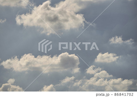 Blue sky full of white clouds, storm day Blue sky full of white clouds, storm day 86841702