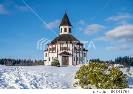 Wooden evangelic chapel in Tesarov in wintertime 86841762
