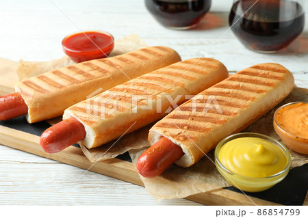 Concept of tasty food with french hot dog Concept of tasty food with french hot dog 86854799