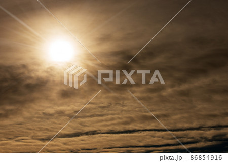 Dark Cloudy Sky with Sunbeams - Full Frame Photography Dark Cloudy Sky with Sunbeams - Full Frame Photography 86854916