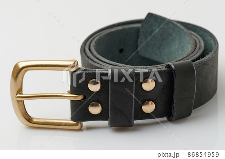 Leather belt roll with golden buckle Leather belt roll with golden buckle 86854959