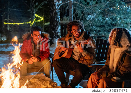 People spending winter holidays in the forest 86857471