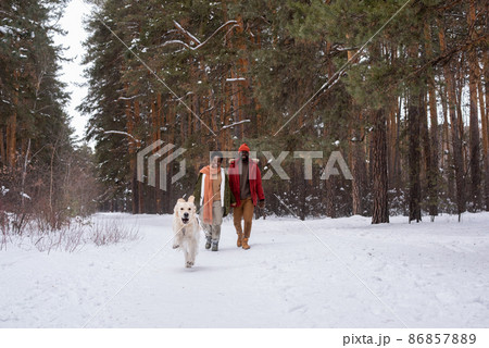 Couple enjoying the walk in the forest 86857889