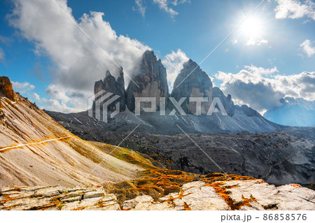 Incredible view of the Three Peaks of Lavaredo on autumn time Incredible view of the Three Peaks of Lavaredo on autumn time 86858576
