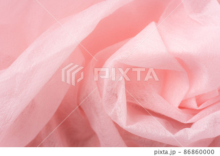 ピンク色の不織布の背景素材 86860000