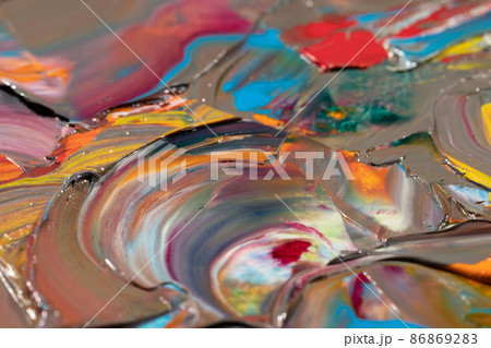 Mixed oil paints close-up. Colorful abstract background 86869283