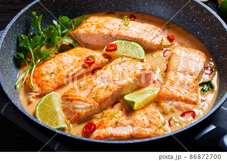 Poached Salmon in hot Coconut Lime Sauce Poached Salmon in hot Coconut Lime Sauce 86872700