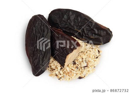 Tonka bean isolated on white background with clipping path and full depth of field. Bean of Dipteryx odorata, Top view. Flat lay 86872732