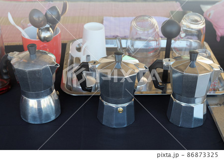 Moka coffee pot traditional Italian espresso on table of slow bar coffee maker. 86873325