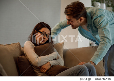 Young couple having argument-conflict, bad relationships. Angry men yells at a woman. Young couple having argument-conflict, bad relationships. Angry men yells at a woman. 86876240