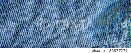 Texture of jeans textile close up. Jeans denim background 86877271