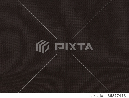 Warm black sweater made of wool. Black fabric background. Warm black sweater made of wool. Black fabric background. 86877458