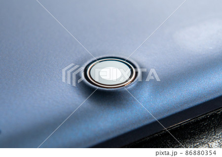 Tablet camera on the back of a mobile digital electronic device. Close-up. Copy space. Macro shot 86880354