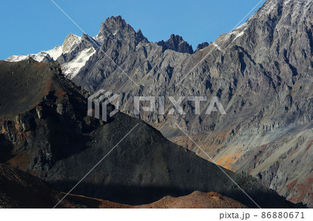 Epic mountain landscape. Severe views of the high rocky mountains 86880671