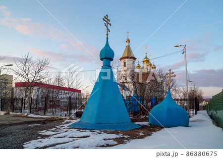 Old blue domes lie on the ground near the Orthodox Church 86880675