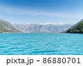 Scenic panoramic landscape view on Bay of Kotor, Montenegro with mountains at sundown. 86880701