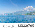 Scenic panoramic landscape view on Bay of Kotor, Montenegro with mountains at sundown. 86880705