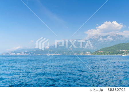 Scenic panoramic landscape view on Bay of Kotor, Montenegro with mountains at sundown. 86880705