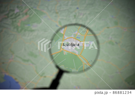 the city of Ljubljana seen through a magnifying glass the city of Ljubljana seen through a magnifying glass 86881234