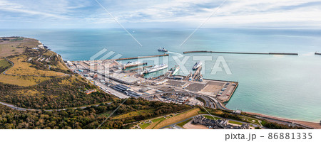 Aerial view of harbour and trucks parked along side each other getting ready for embarking the Dover Ferry to Calais 86881335