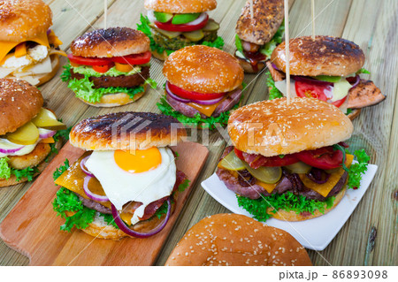 Set of burgers made with various fillings Set of burgers made with various fillings 86893098