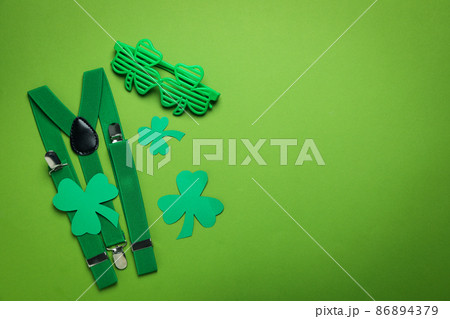 St.Patrick's Day accessories on green background, space for text 86894379