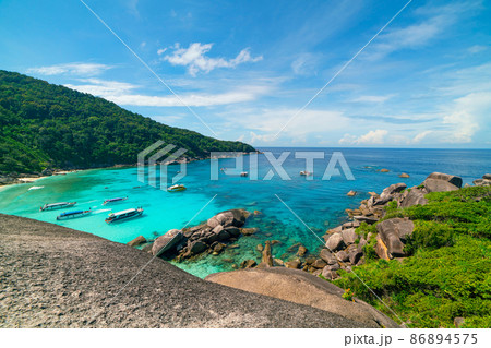 Beautiful sandy beach with wave crashing on sandy shore at Similan Islands Beautiful tropical sea Similan island No.8 at Similan national park, Phang nga Thailand 86894575