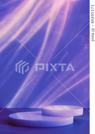 empty podiums on blue background with light caustic effect 86895373