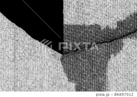Crack on slate structure, damaged surface, broken weathered texture, dent material background, close up 86897012