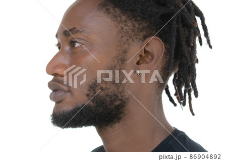 A black and white profile portrait of a handsome man. 86904892