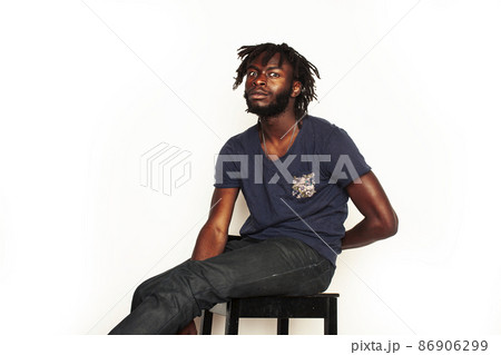 young handsome african american man gesturing emotional posing isolated on white background stylish hipster. youth concept young handsome african american man gesturing emotional posing isolated on white background stylish hipster. youth concept 86906299