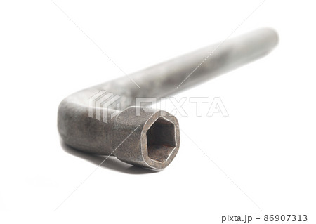 car key for repairing wheels isolated on white background 86907313