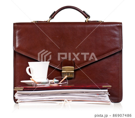 Brown leather briefcase with office accessories 86907486