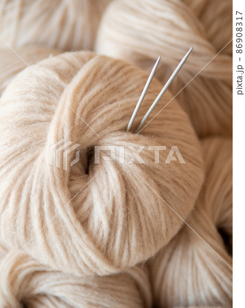 Aesthetic beige yarn skein, close up Aesthetic beige yarn skein, close up 86908317