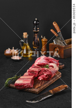 Raw fresh beef short ribs on cutting board Raw fresh beef short ribs on cutting board 86909554