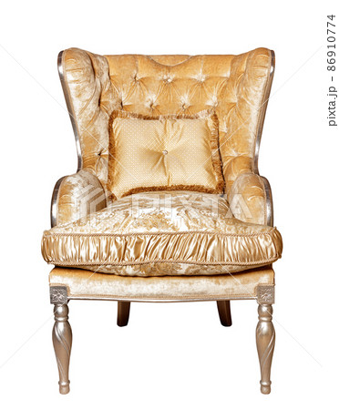 Luxurious upholstered armchair with brocade silver upholstery, isolated on a white background. Luxurious upholstered armchair with brocade silver upholstery, isolated on a white background. 86910774