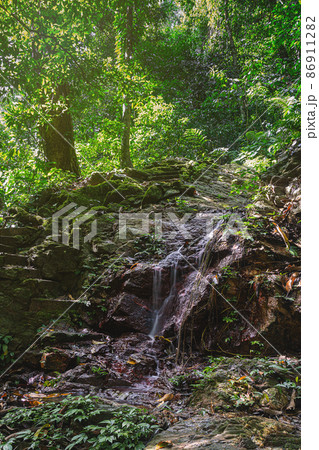 Amazing waterfall in green forest Laong Rung Waterfall Yala Thailand Amazing waterfall in green forest Laong Rung Waterfall Yala Thailand 86911282
