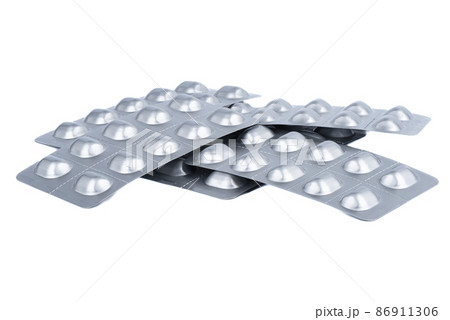 Several blister packs of pills isolated on a white background. Several blister packs of pills isolated on a white background. 86911306
