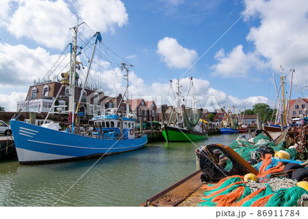 Fishing Trawler in Neuharlingersiel, Lower Saxony, Germany Fishing Trawler in Neuharlingersiel, Lower Saxony, Germany 86911784