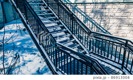 Snow covered urban stairs with snow 86913008