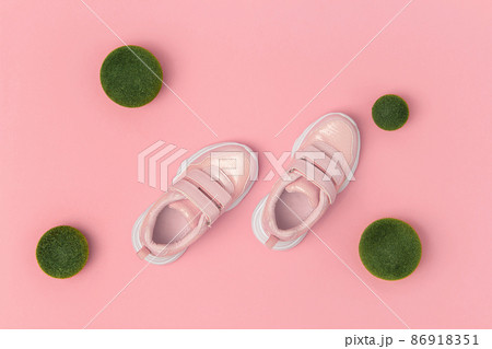 Sports shoes, sneakers on pink background. Sport lifestyle concept Top view Flat lay Copy space 86918351